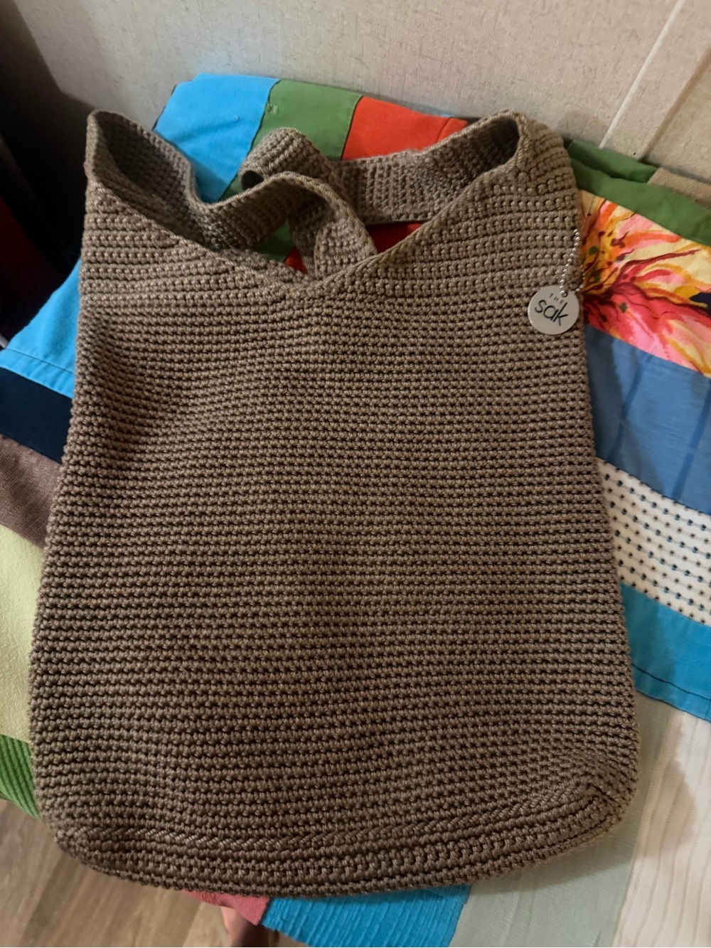 The Sak Tan Crocheted Shoulder Bag with Branded Zip Tag